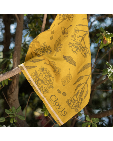 Torchon couleur ocre, matière 100% coton, avec logo Clovis et logo nature et graine de moutarde, tissé par la maison Moutet