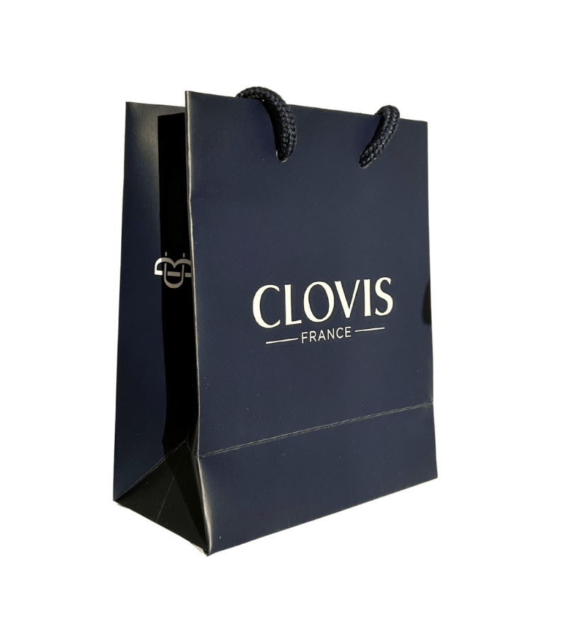 Petit sac noir de 19cm. Sac de marque Clovis, du groupe Charbonneaux-Brabant. Poignées en cordes en coton noir.