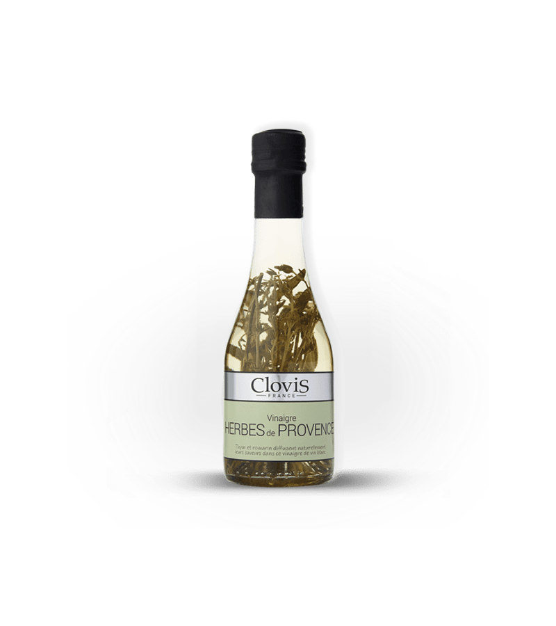 Bouteille de Vinaigre Herbes de Provence, marque Clovis, format 25cl, sur fond blanc
